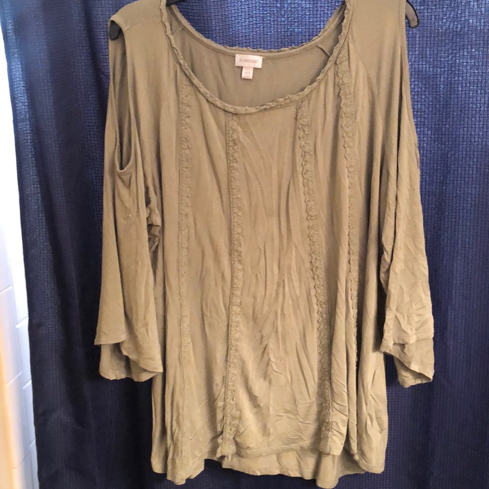 Light green flowing shirt with shoulder cut outs